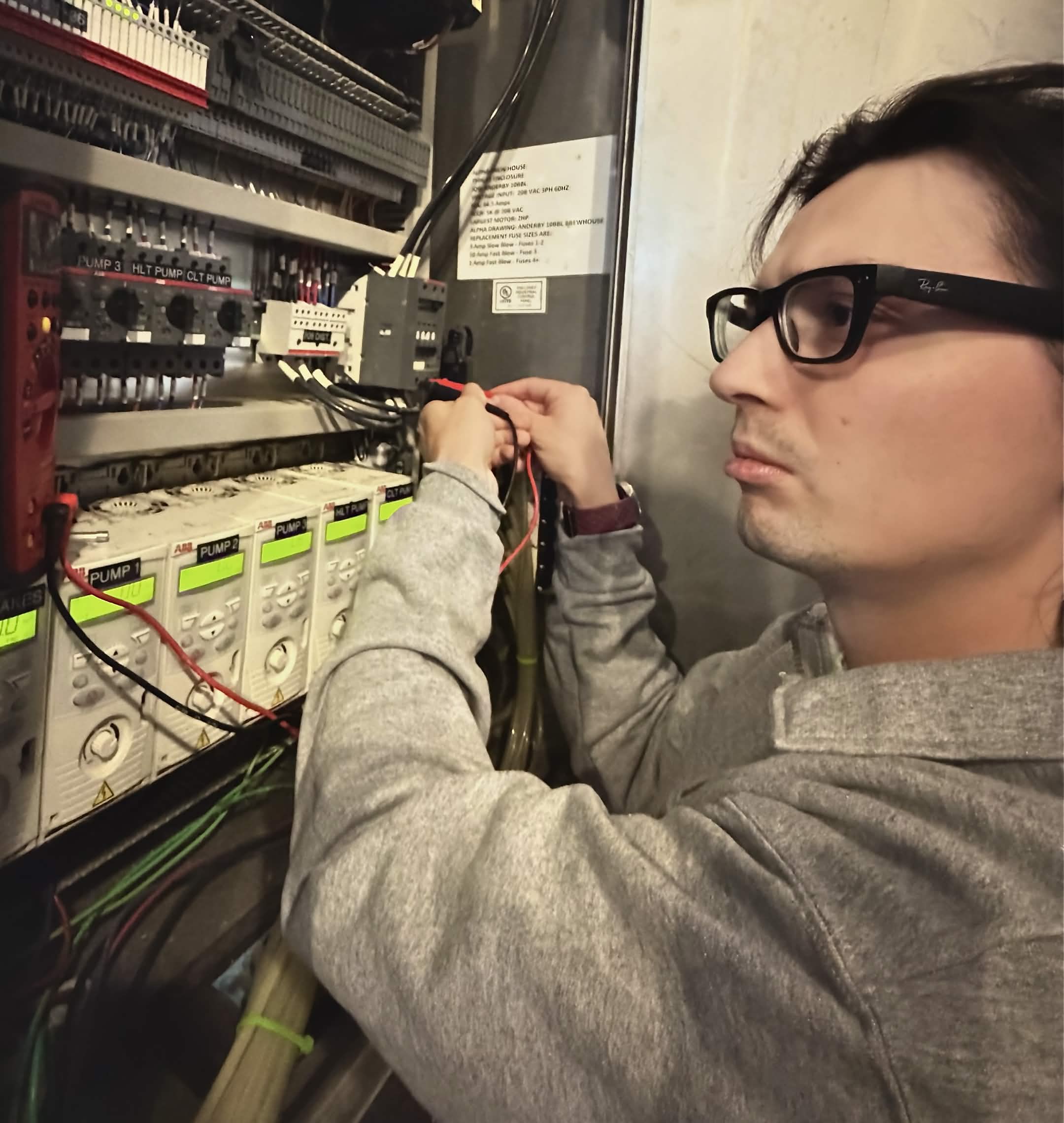 Field technician wearing smart glasses while a remote expert guides them